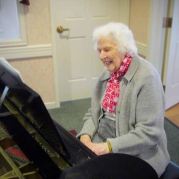 Pat plays the piano at Newhaven Court at Lindwood assisted living