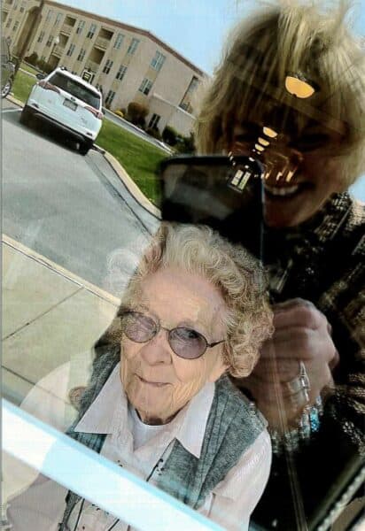S Young's Photo of Her Mom taken through her apartment window at Colonial Courtyard at Clearfield. Susan is in reflection