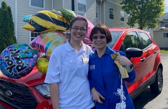 Maricris Cooper, right, is joined by her daughter Colleen Cooper in front of the new Ford Ecosport Maricris won as part of the IntegraCare Continued Attendance Rewards (CAR) Program on Wednesday, May 19, 2021. Photo courtesy of IntegraCare.