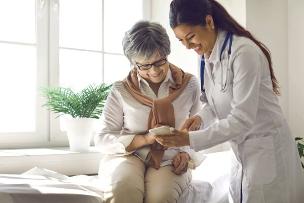 A senior woman visits her doctor