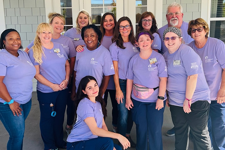 group of females taking a group photo