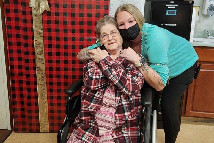 Elderly woman and nurse