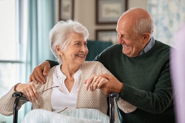 A happy senior couple smiling and laughing