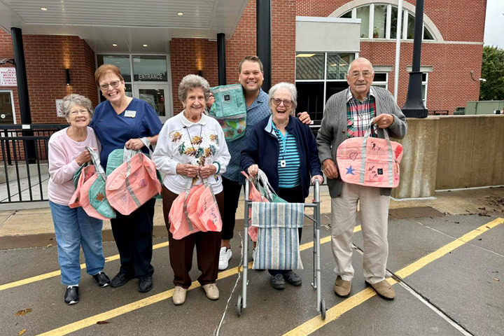Colonial Courtyard at Bedford Seniors Craft Hope for Foster Care Children