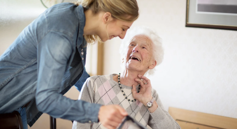 senior and caregiver