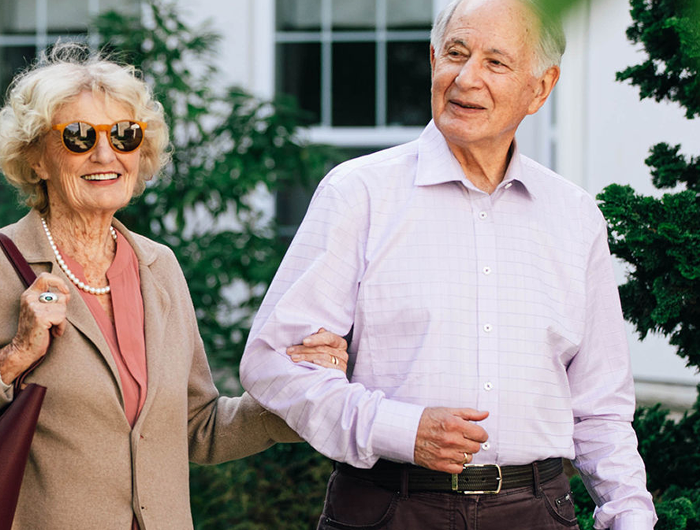 Senior couple happily strolling