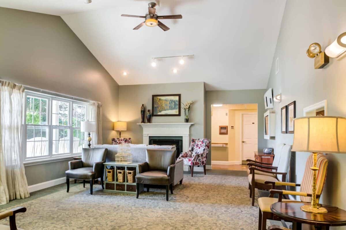 common room with fireplace and seating