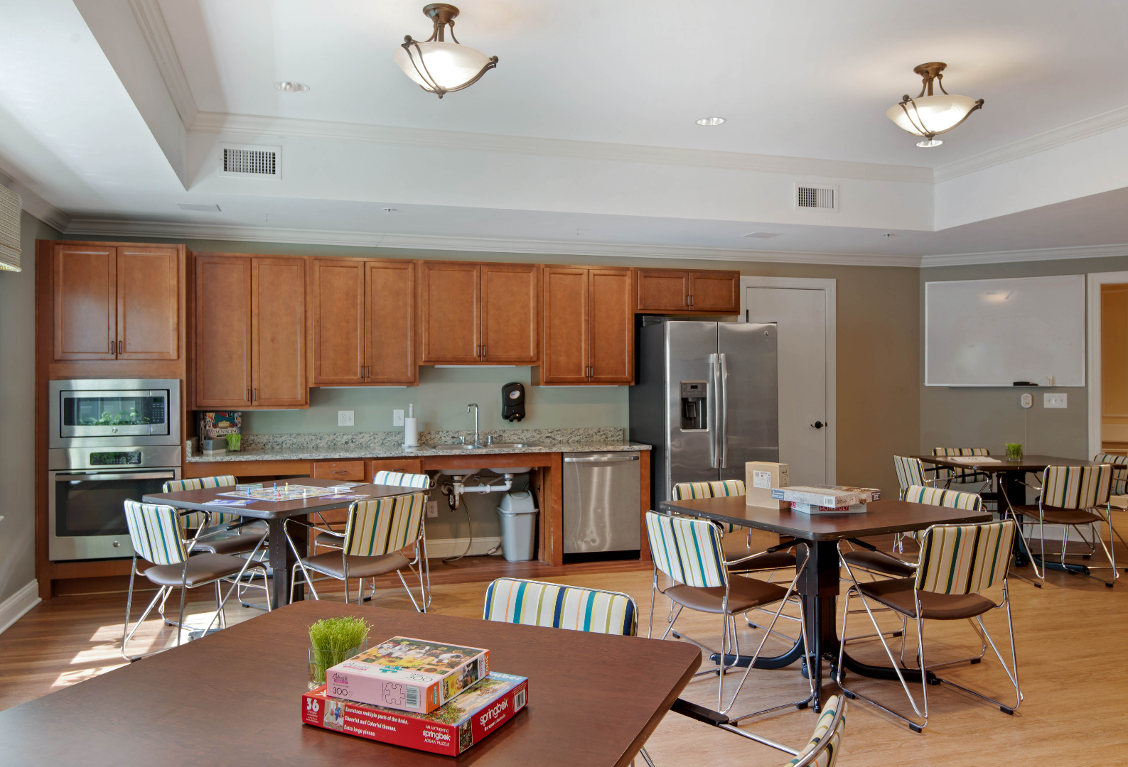 candle light cove cafe with tables and chairs