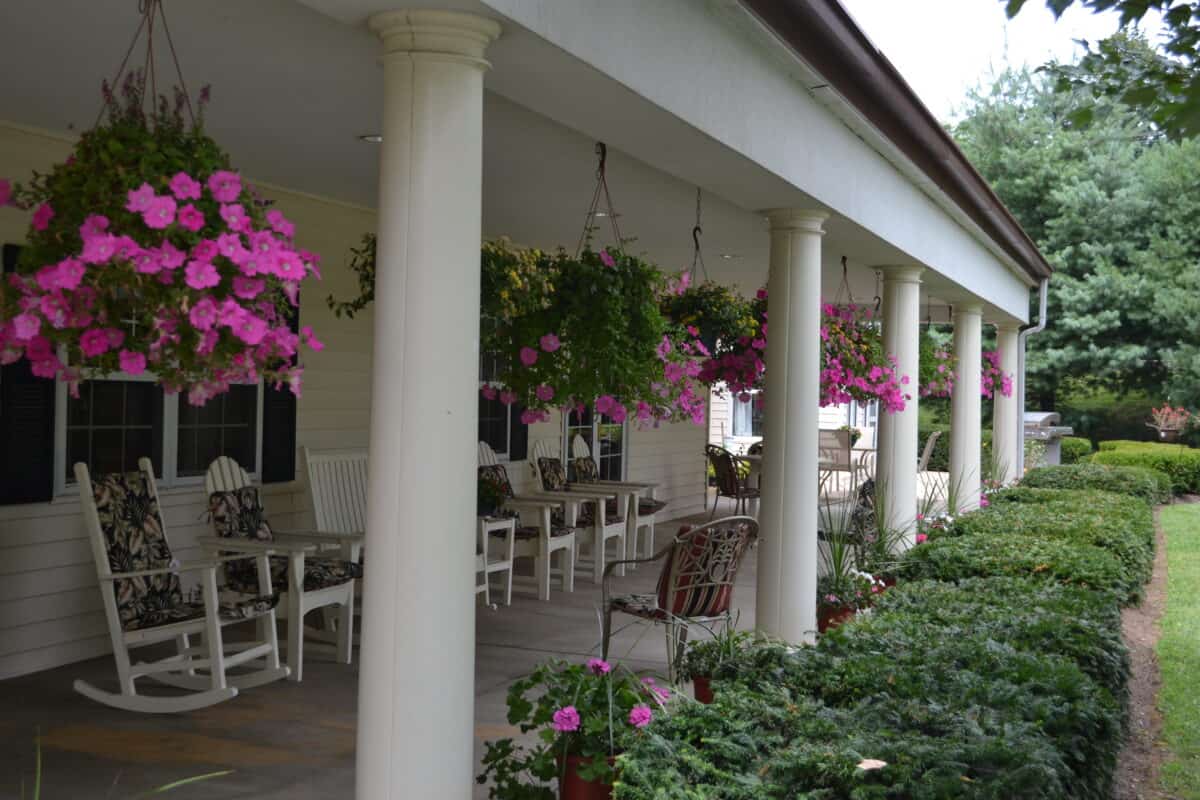 glen mills porch with hanging baskets