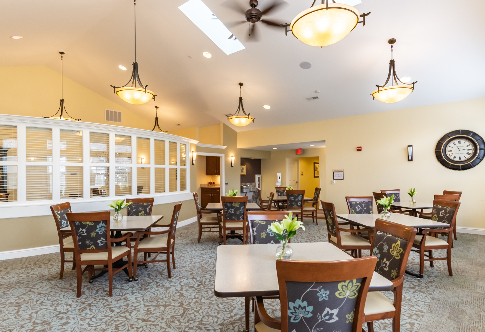 common area with multiple tables and chairs