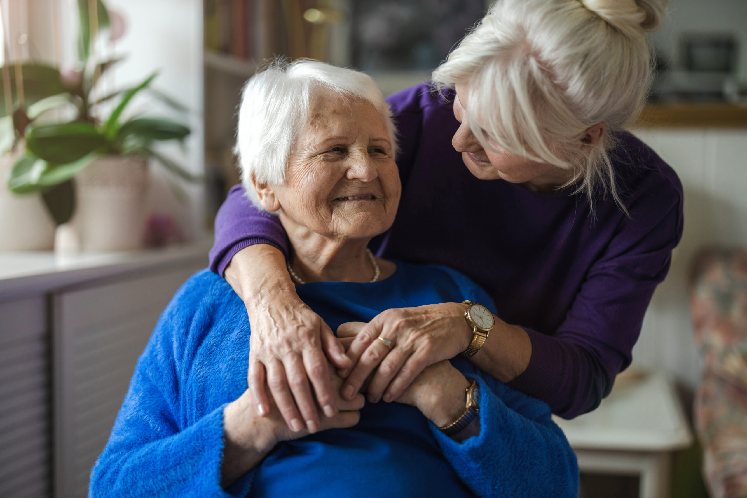 Adult daughter caring for senior mother