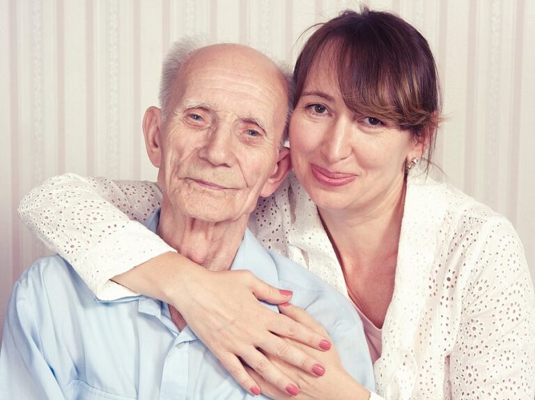 Senior man with female caregiver