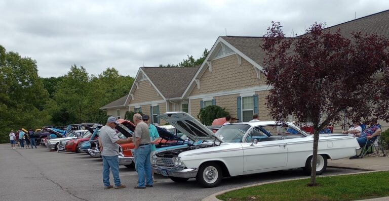 Cars and visitors at the Leaonard Street Car and Bike Show 2025 at Colonial Courtyard at Cleafield