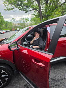 The Woods Joyce Serrano with her new car 