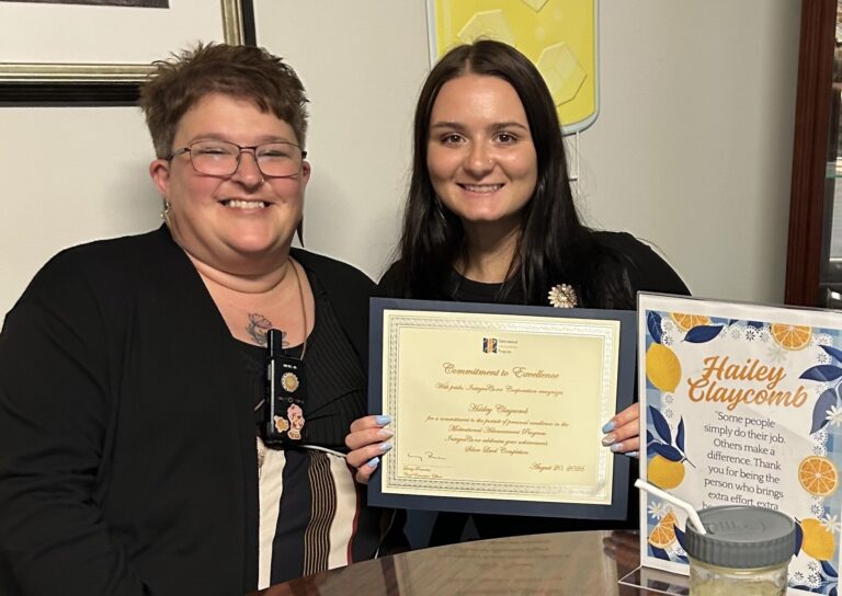 Colonial Courtyard at Bedford recognized its IntegraCare Motivational Advancement Program (MAP) graduate during a ceremony on Aug. 20. From left, Tonya Leighty, Resident Wellness Coordinator; and Hailey Claycomb, Resident Wellness Associate (Silver Level graduate).