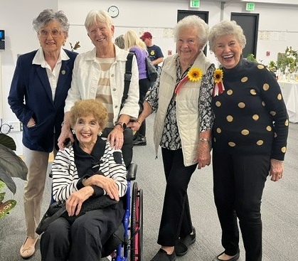 Queenstown Landing residents with Rose Marie Wright, garden club